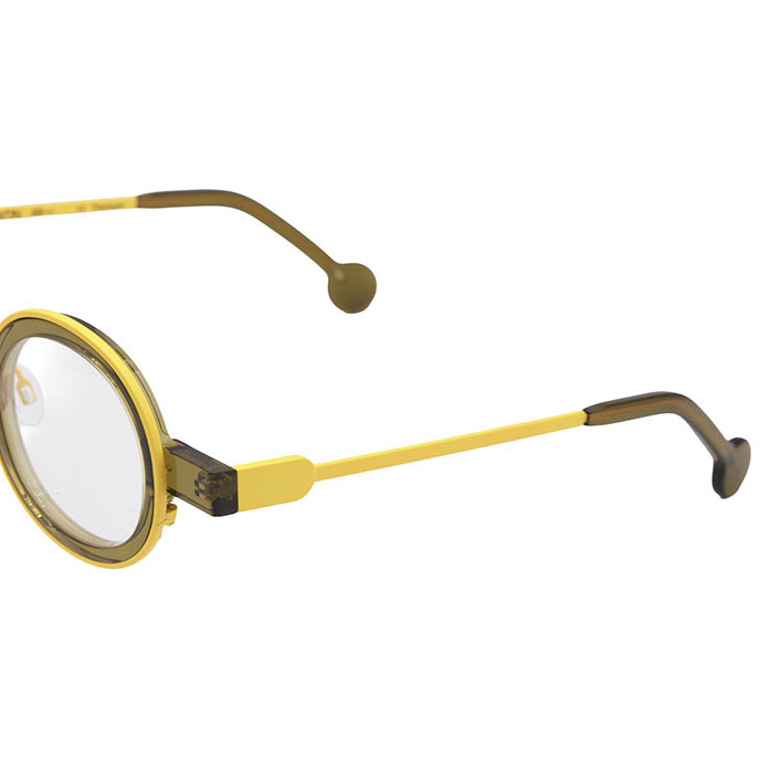 Anne & Valentin : légèreté graphique et touches solaires Lunettes Anne et Valentin rondes jaunes et dorées au design minimaliste chez Optique Audition Suin Valenciennes