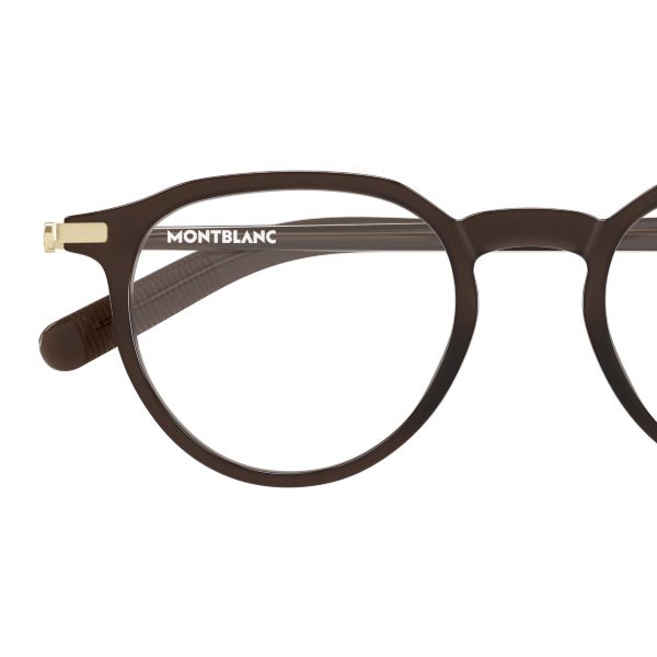 Découvrez les montures Montblanc disponibles sur notre boutique en ligne Détail de la monture Montblanc MB0495 mettant en avant le logo emblématique et les finitions haut de gamme