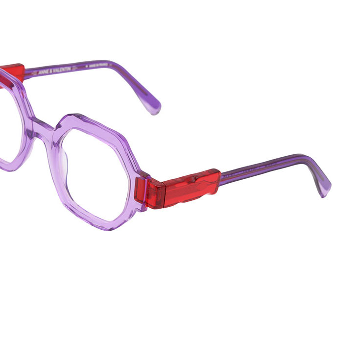 Anne & Valentin : une monture graphique et colorée Lunettes Anne et Valentin violettes translucides avec branches orange et rouges chez Optique Audition Suin Valenciennes