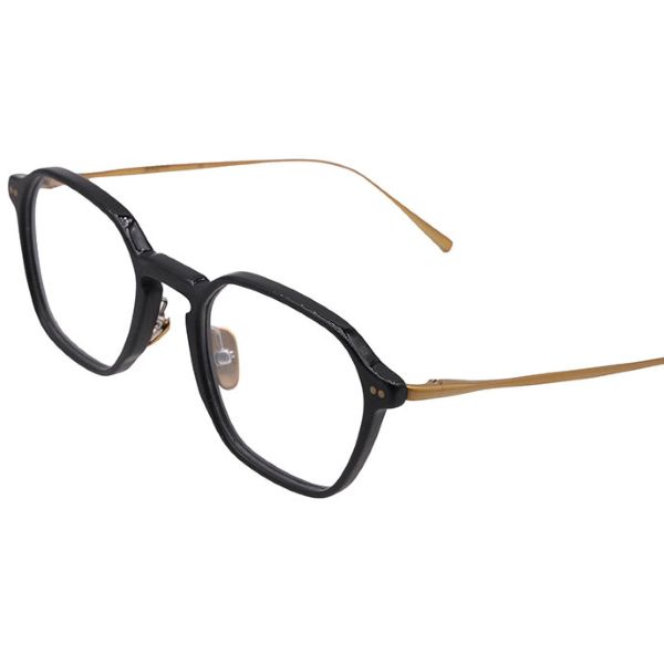 Brett : contraste des matières et élégance masculine Lunettes Brett noires aux branches métalliques dorées chez Optique Audition Suin Valenciennes